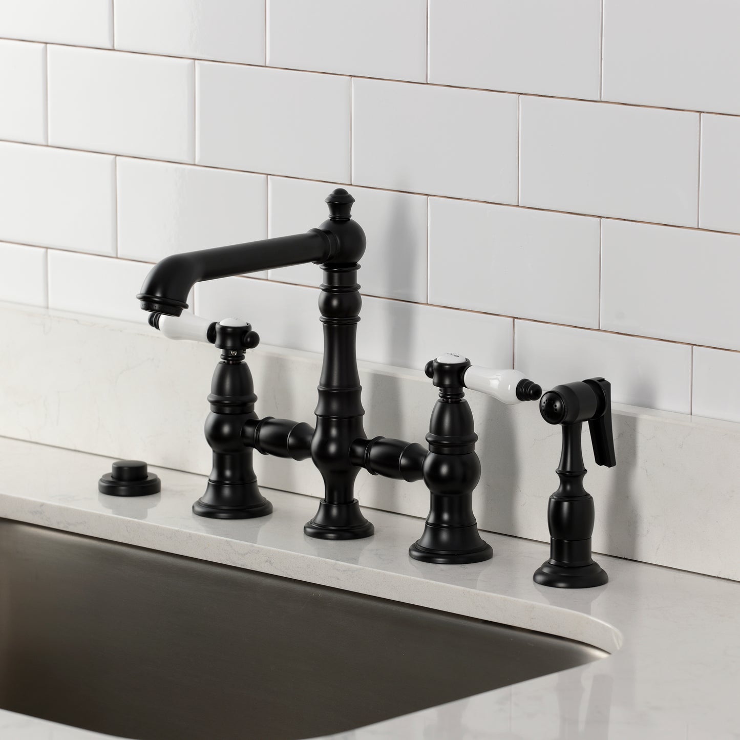 Kingston KS7277BPLBS Bel-Air Bridge Kitchen Faucet with Brass Sprayer, Brushed Brass shown in black finish.