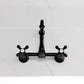 Kingston KS2443AX Heritage Two-Handle Wall Mount Bridge Kitchen Faucet, Antique Brass on a marble countertop
