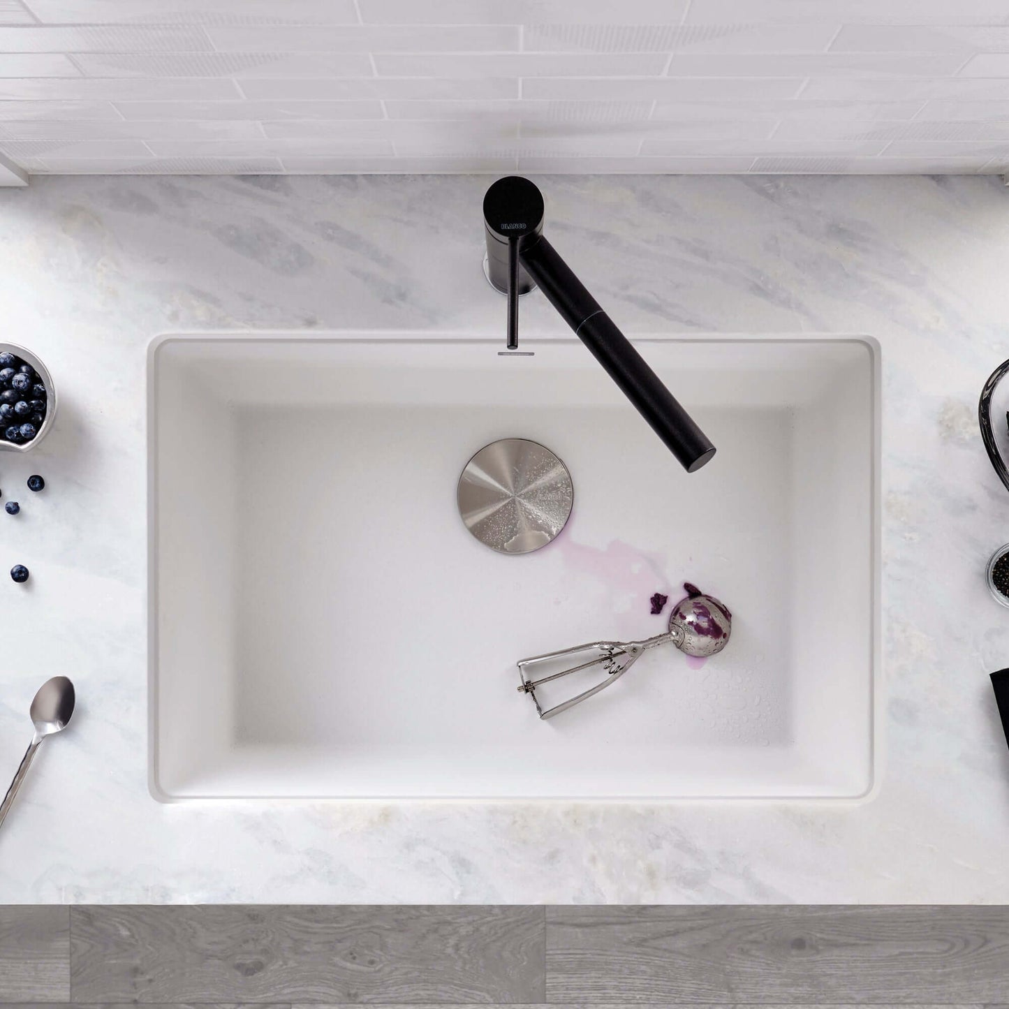 BLANCO PRECIS 27" SILGRANIT Single Bowl Undermount Sink with modern faucet and countertop.