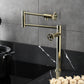 Kingston Brass KS4703RKX Webb Deck Mount Pot Filler Faucet with Knurled Handle, Antique Brass on kitchen countertop