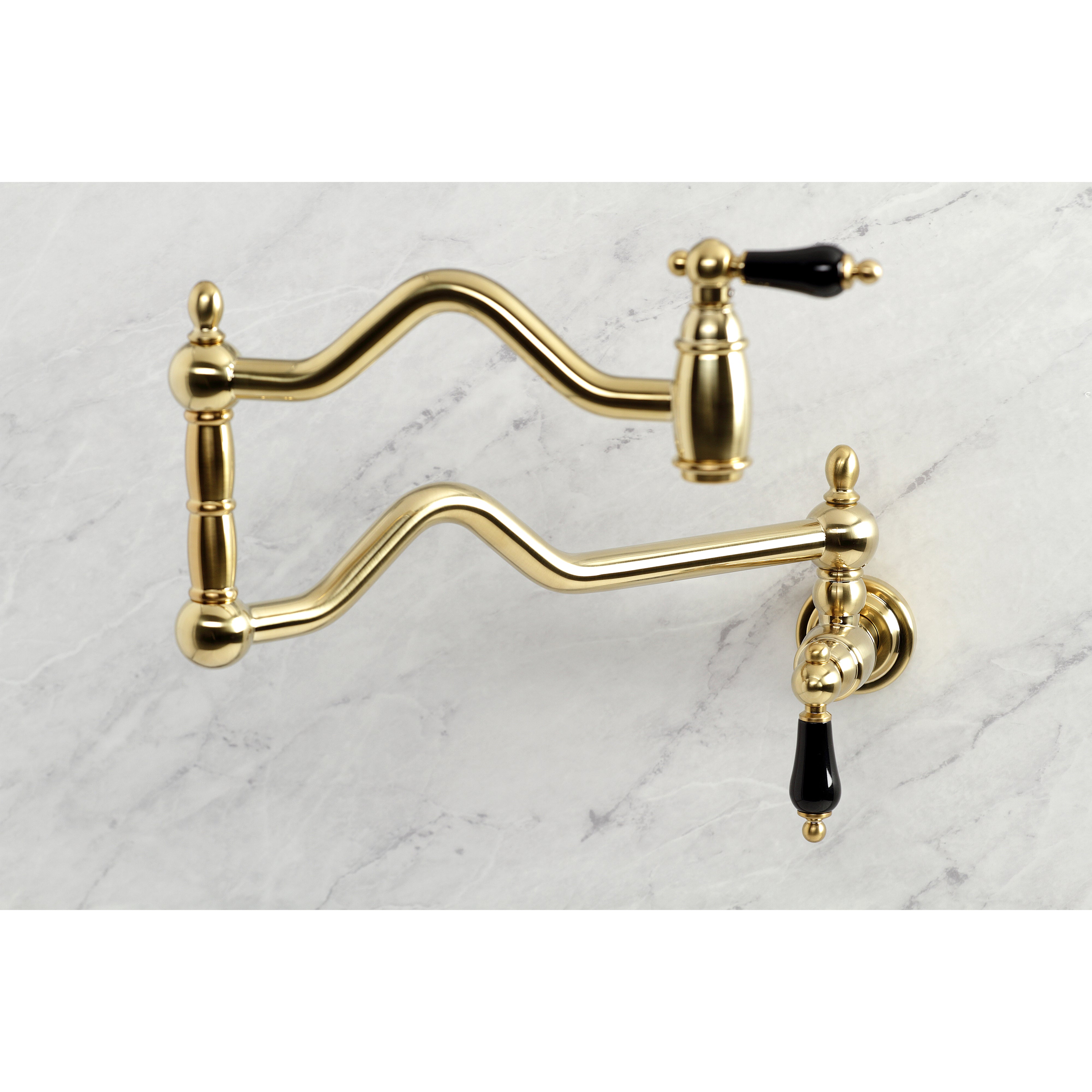 Kingston Brass KS2107PKL Duchess Wall Mount Pot Filler Faucet, Brushed Brass on marble surface