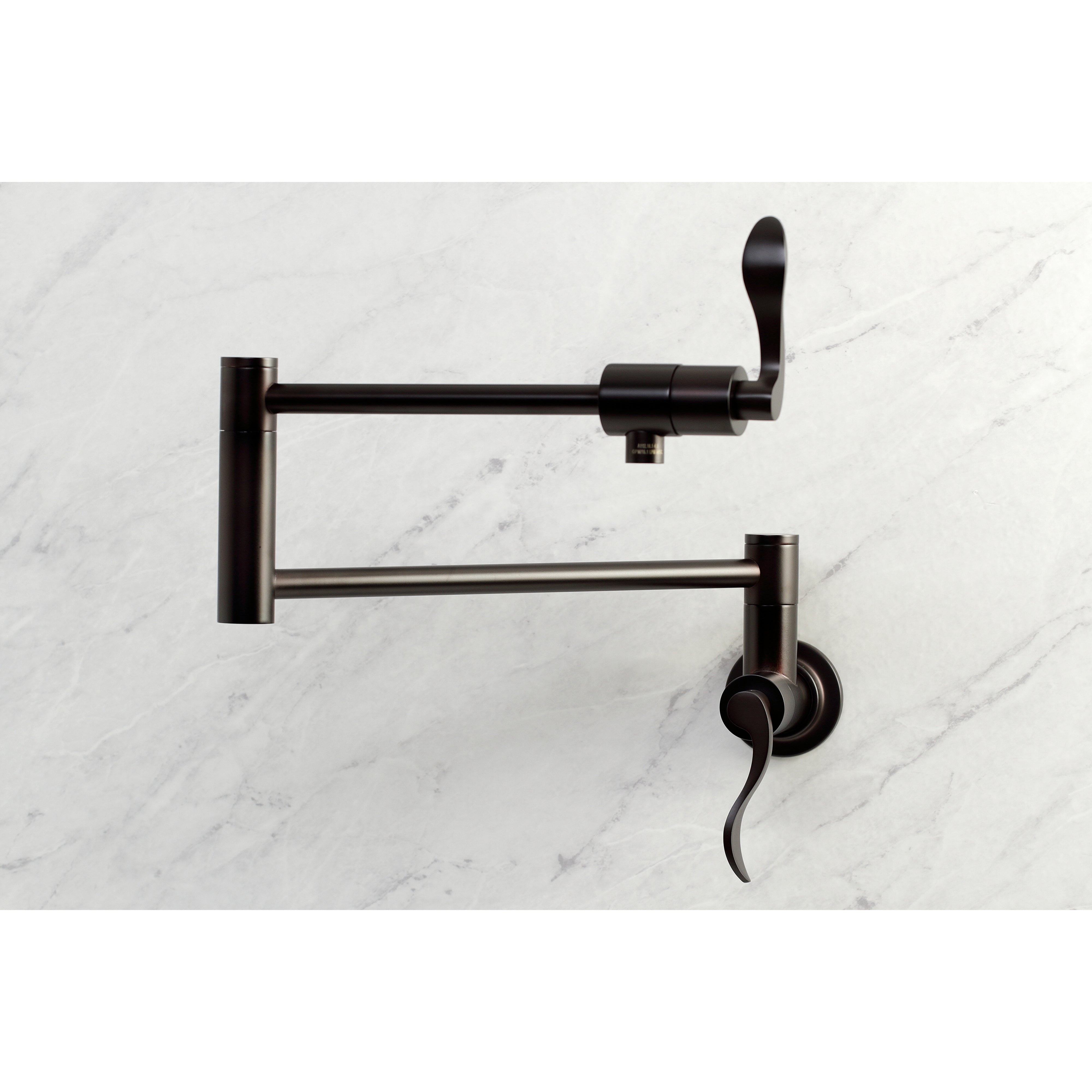 Kingston Brass KS4103DFL NuWave Wall Mount Pot Filler Faucet, Antique Brass on a marble background.