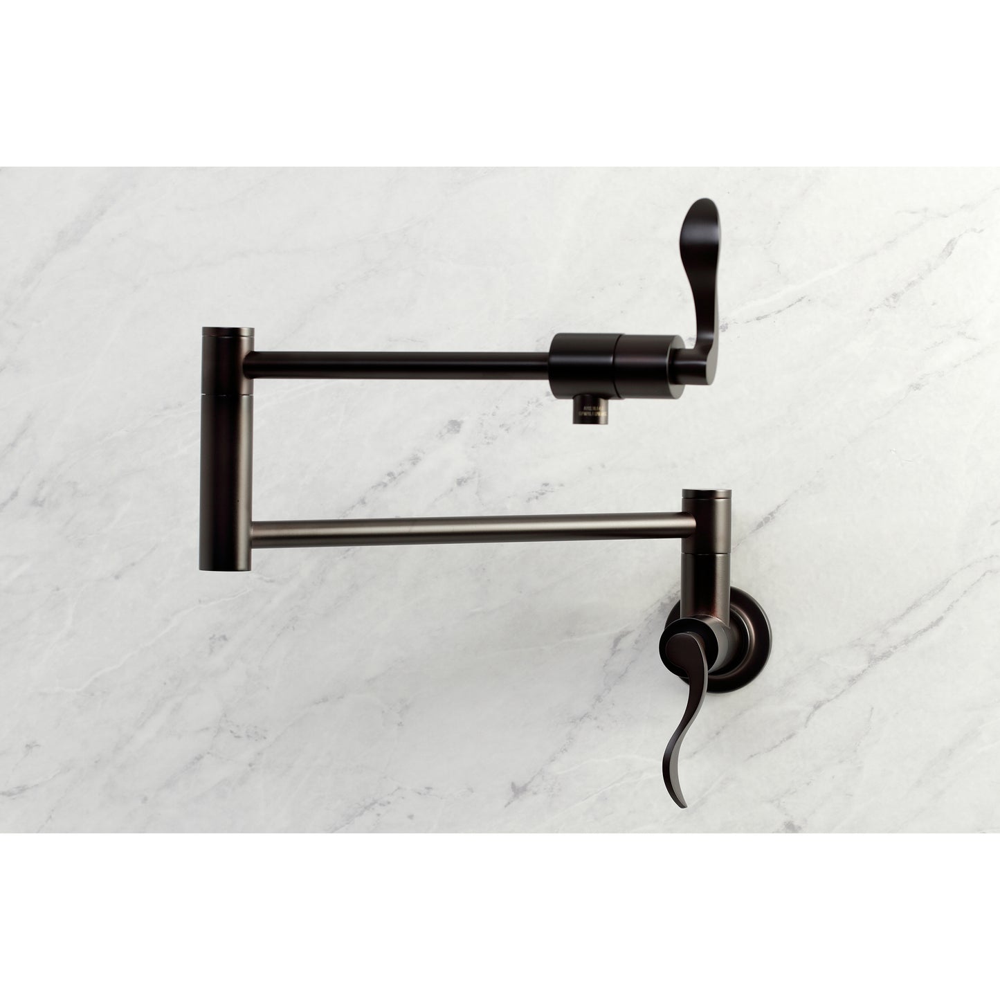 Kingston Brass KS4103DFL NuWave Wall Mount Pot Filler Faucet, Antique Brass on a marble background.