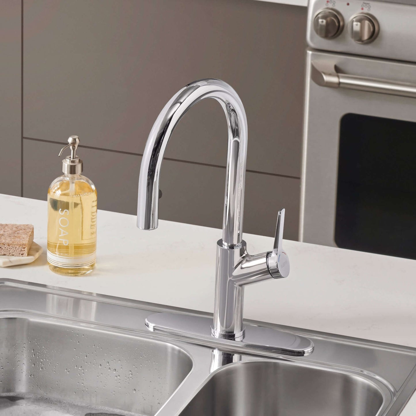 BLANCO Urbena Pull-Down Dual-Spray Kitchen Faucet showcasing contemporary design in a modern kitchen setting.
