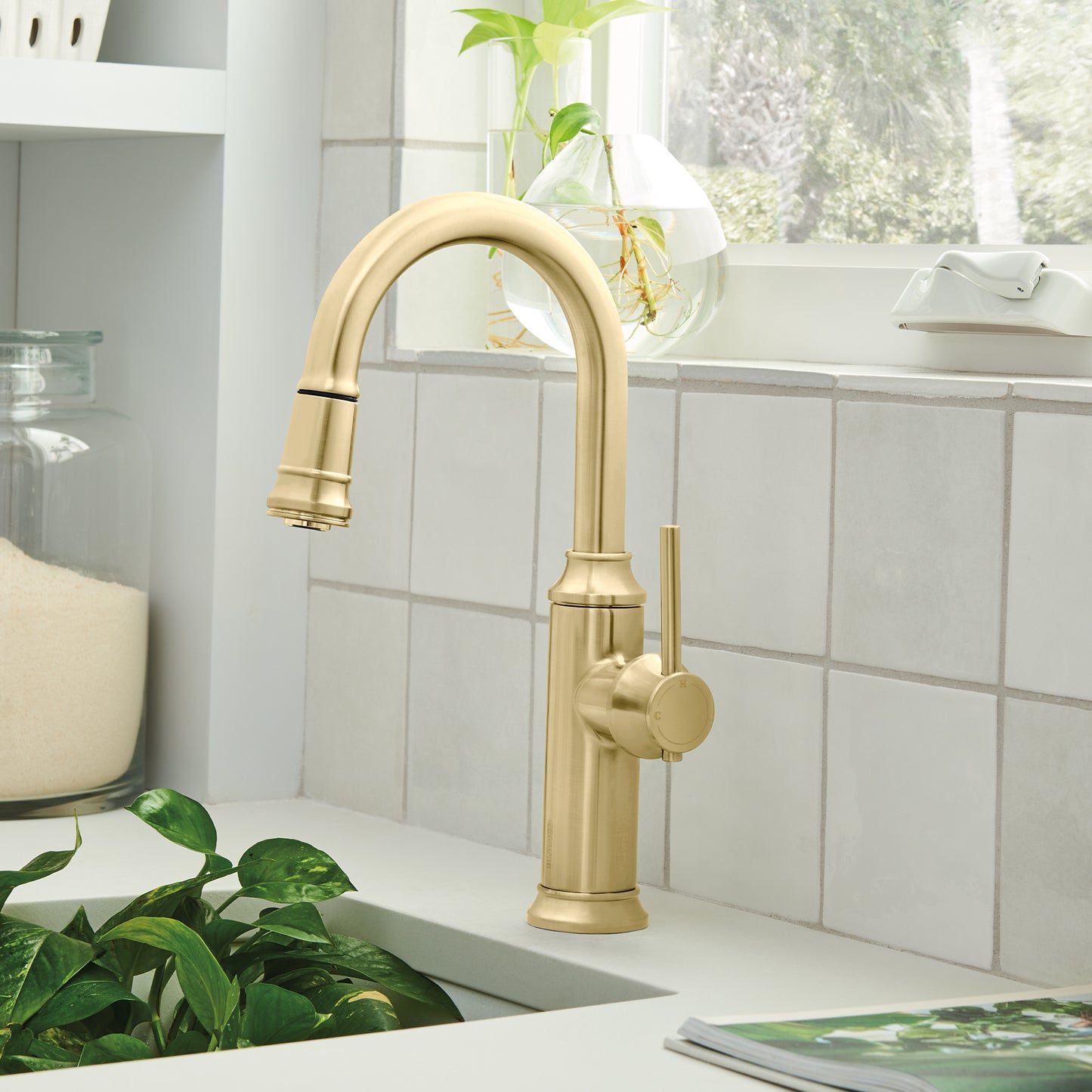 BLANCO Empressa Pull-Down Bar Faucet in a golden finish, featuring elegant design for bar and kitchen island use.