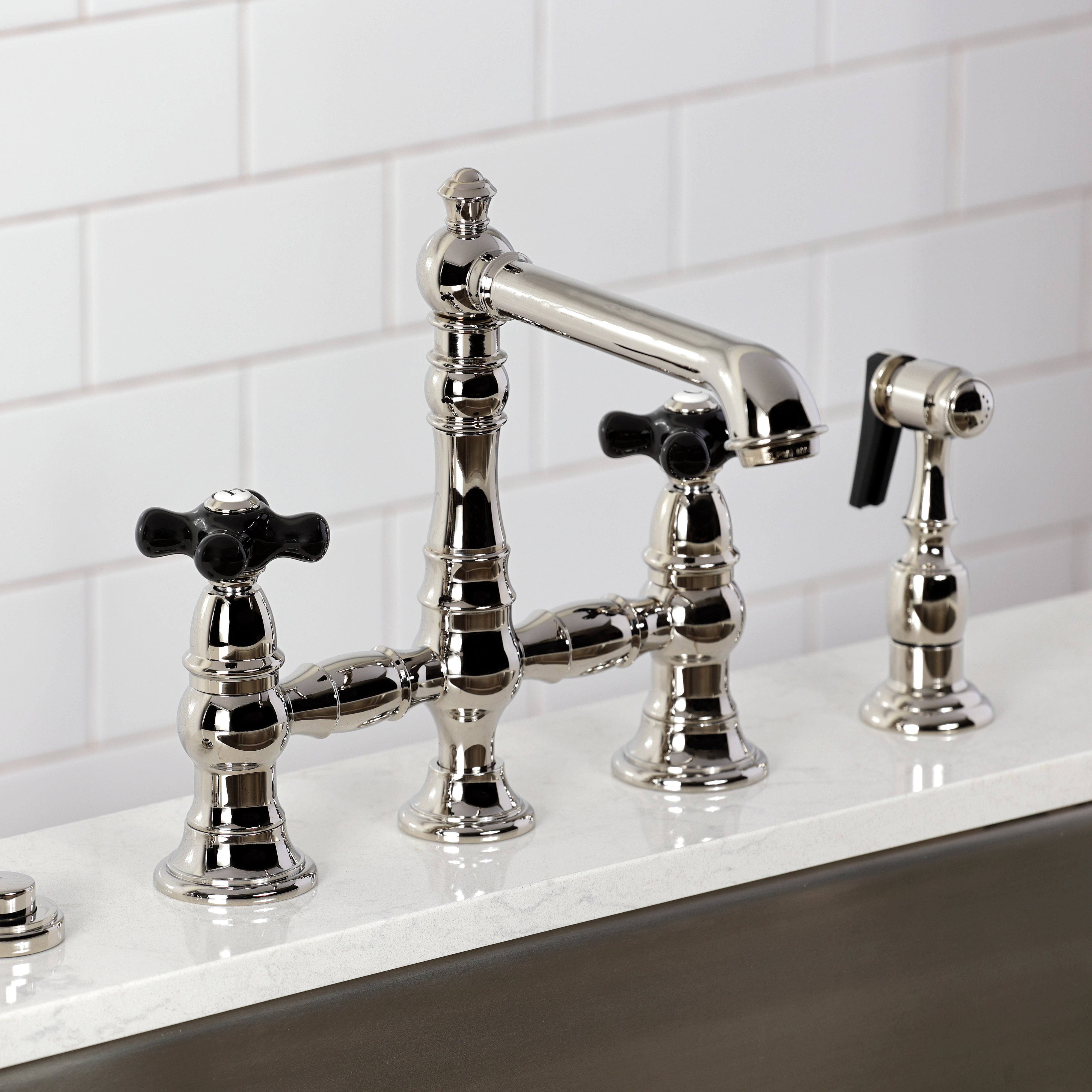Kingston KS7277PKXBS Duchess Bridge Kitchen Faucet with Brass Sprayer, Brushed Brass close-up view
