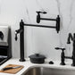 Kingston Brass KS3708TAL Tudor Deck Mount Pot Filler Faucet, Brushed Nickel on the kitchen countertop.