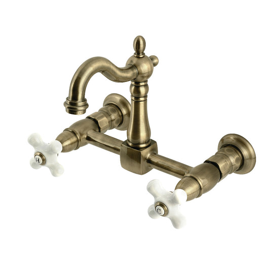 Kingston KS2443PX Heritage Two-Handle Wall Mount Bridge Kitchen Faucet, Antique Brass with porcelain cross handles