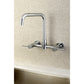 Kingston Brass KS8168DL Concord Wall Mount Bridge Kitchen Faucet mounted on a textured wall.