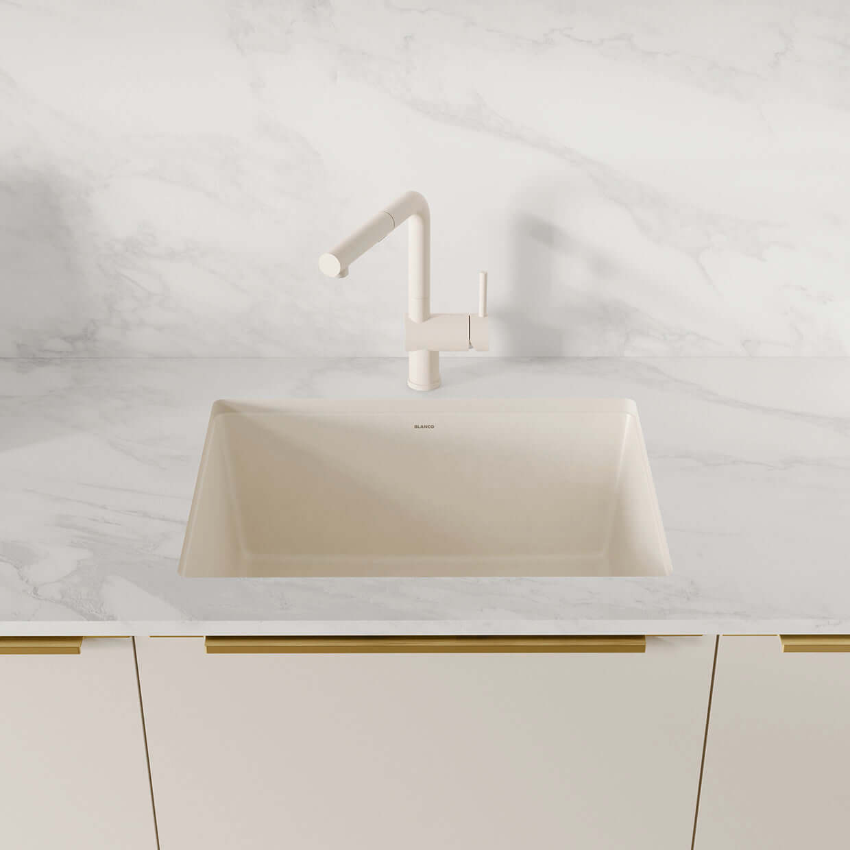 BLANCO PRECIS 24" SILGRANIT Compact Undermount Sink in a modern kitchen setting with elegant faucet.
