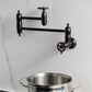 Kingston Brass KS3103CG Fuller Wall Mount Pot Filler Faucet, Antique Brass mounted with pot below