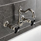 Kingston KS1263PKX Duchess Two-Handle Wall Mount Bridge Kitchen Faucet, Antique Brass with black porcelain handles