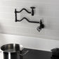 Kingston Brass KS2107RKZ Wendell Wall Mount Pot Filler Faucet with Knurled Handle, Brushed Brass in kitchen