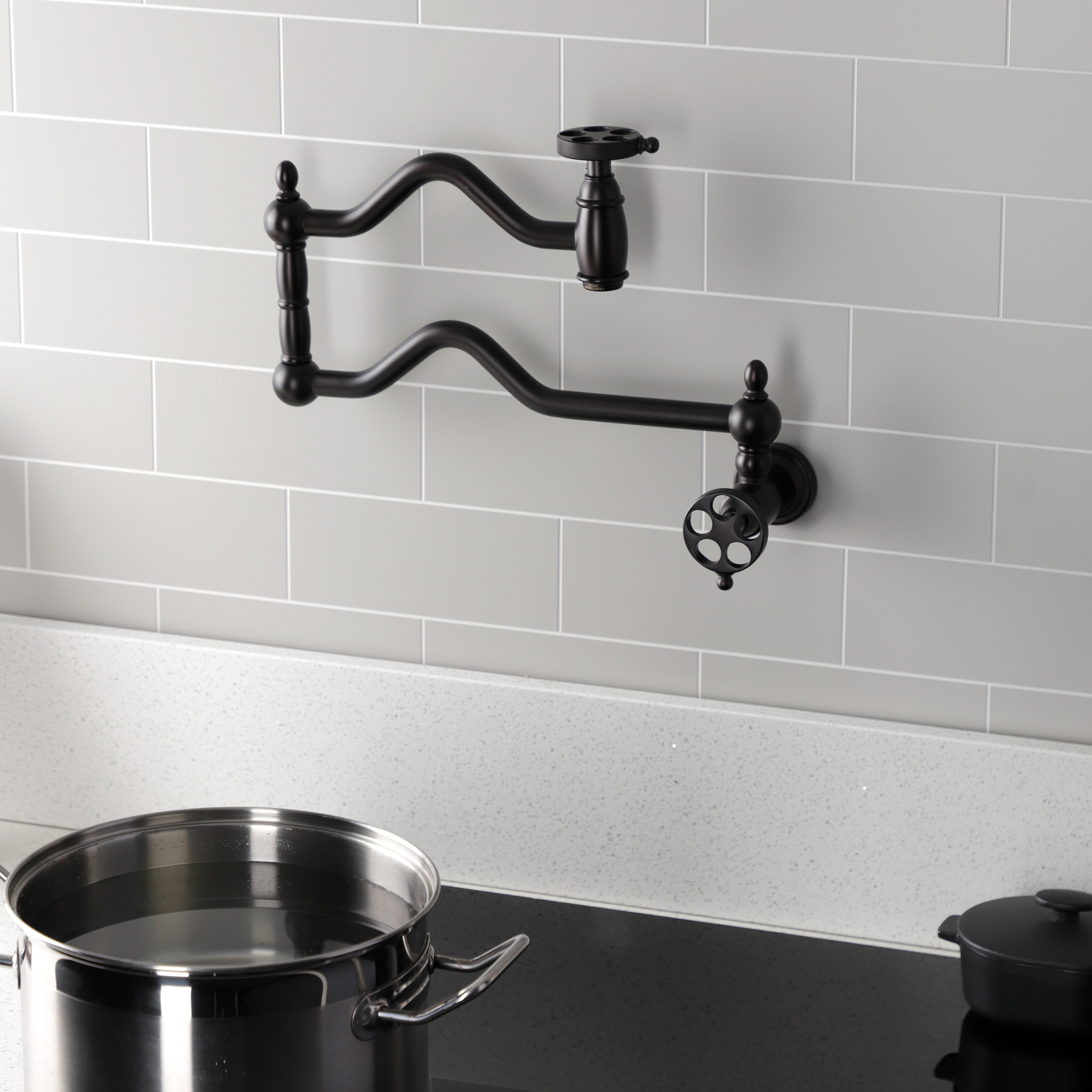 Kingston Brass KS2107RKZ Wendell Wall Mount Pot Filler Faucet with Knurled Handle, Brushed Brass in kitchen