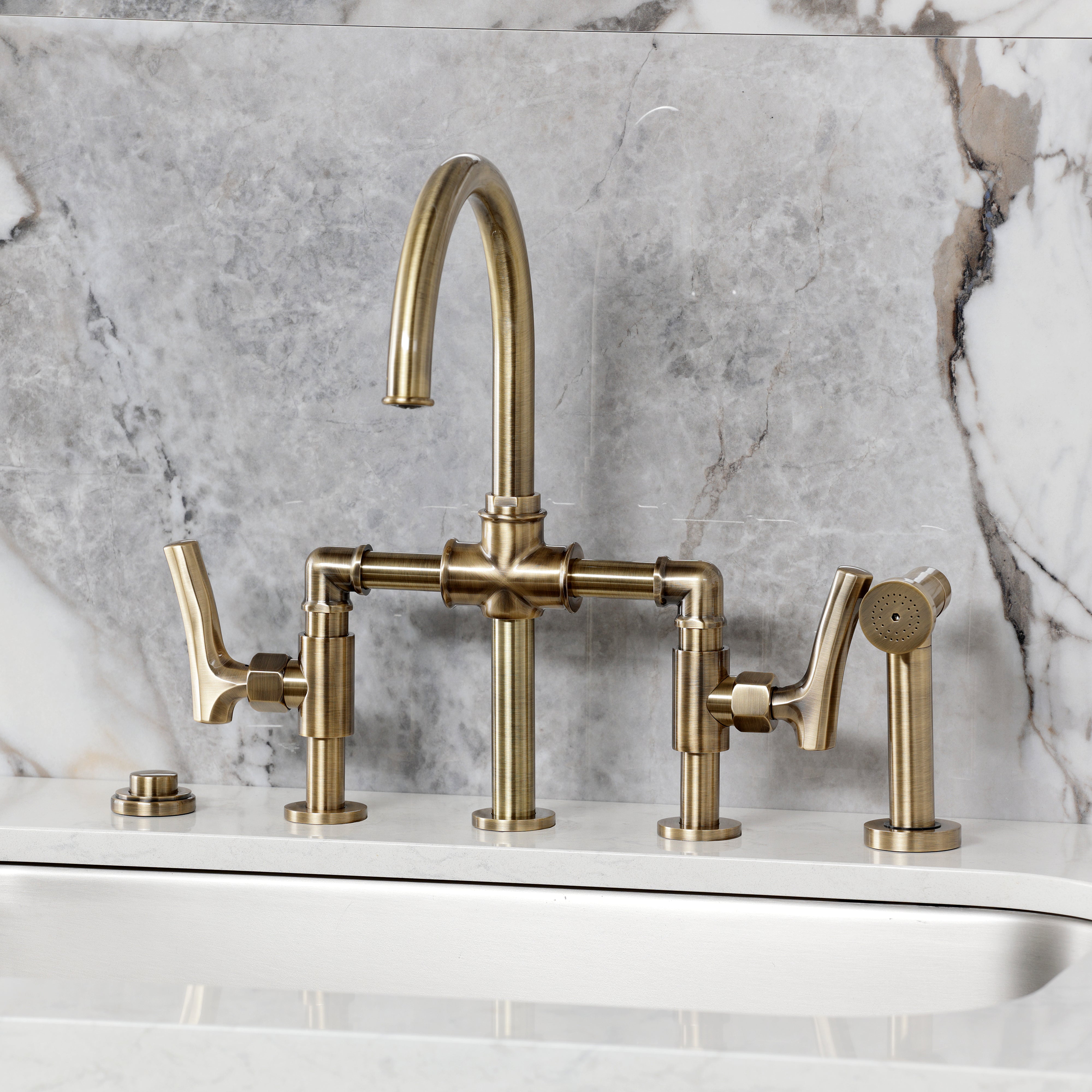 Kingston KS2333TKL Hallerbos Bridge Kitchen Faucet with Brass Sprayer, Antique Brass on marble countertop