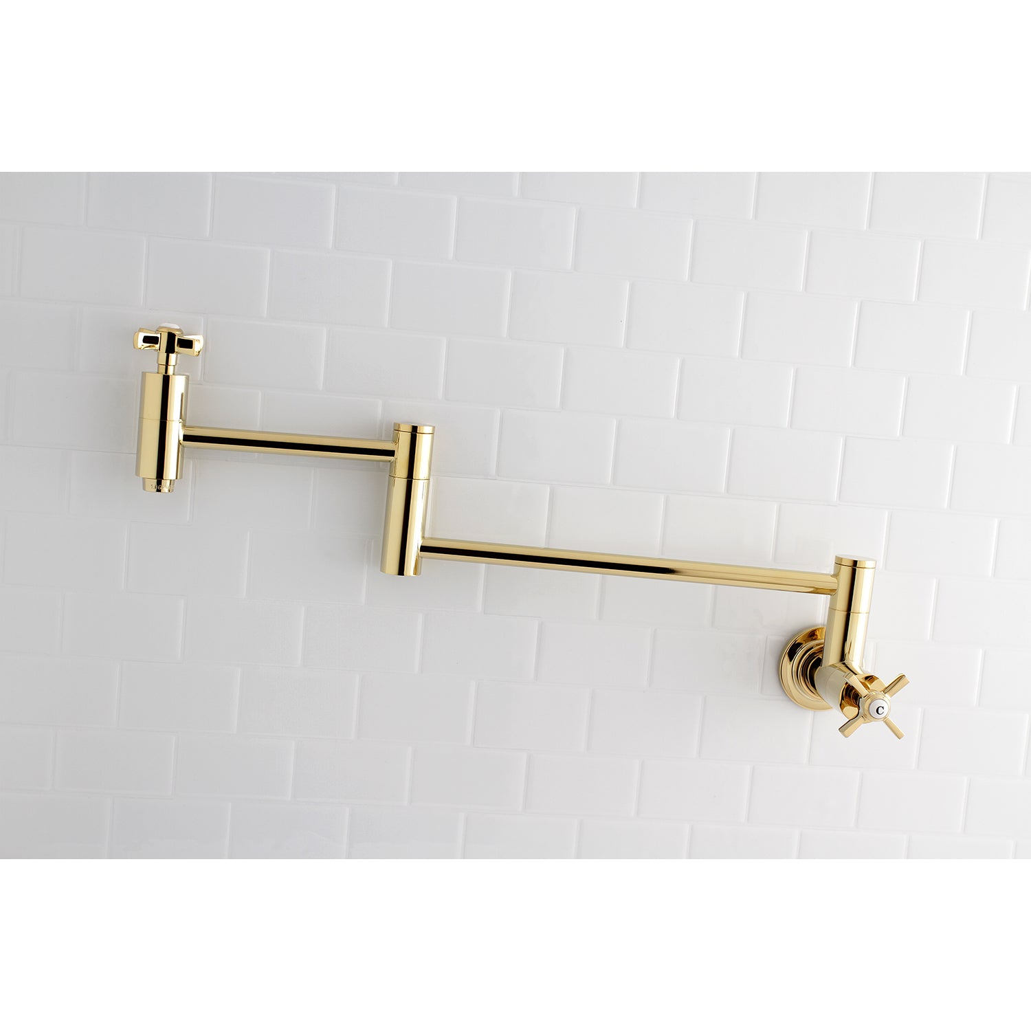 Kingston Brass KS8103ZX Millennium Wall Mount Pot Filler Faucet, Antique Brass on white tile background.