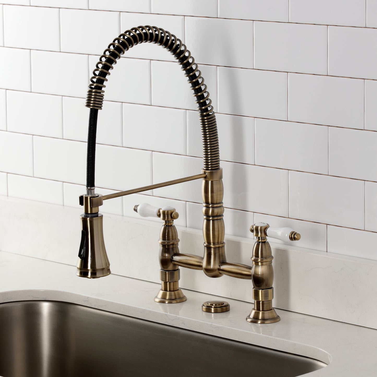 Kingston Brass GS1273BPL Bel-Air Double-Handle Deck-Mount Pre-Rinse Bridge Kitchen Faucet, Antique Brass