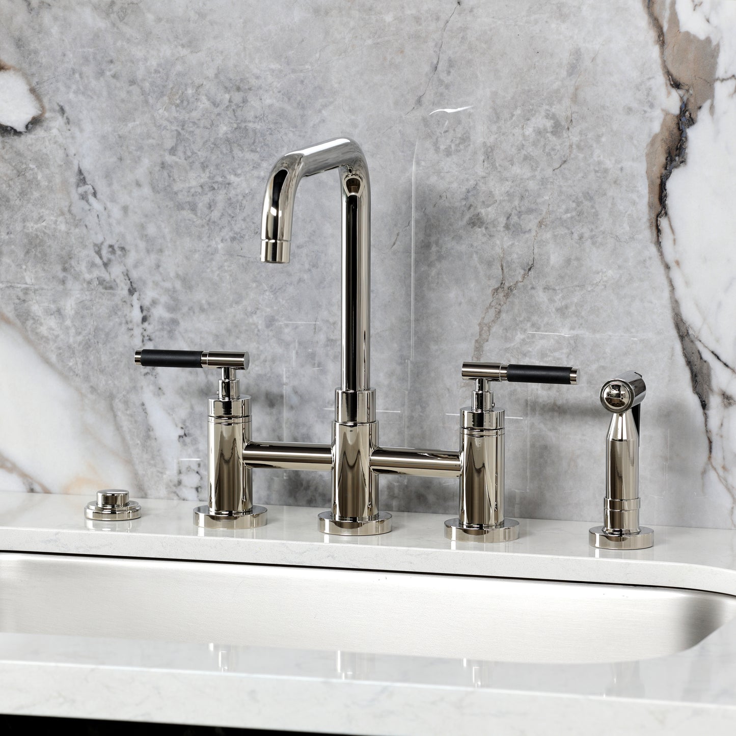 Kingston KS8287CKLBS Kaiser Bridge Kitchen Faucet with Brass Sprayer, Brushed Brass on marble countertop.