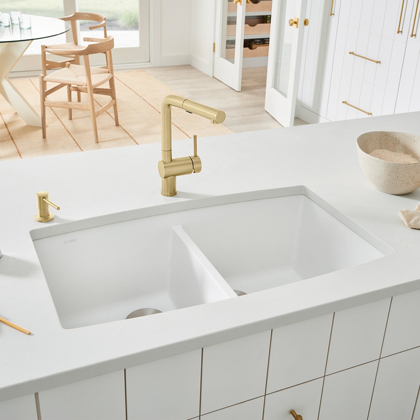 BLANCO Performa SILGRANIT 33" 50/50 Double Bowl Undermount Kitchen Sink with modern faucet in a stylish kitchen.