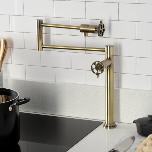 Kingston Brass KS4703RKX Webb Deck Mount Pot Filler Faucet with Knurled Handle, Antique Brass on kitchen counter.