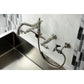 Kingston KS1243ALBS Heritage Two-Handle Wall Mount Bridge Kitchen Faucet with Brass Sprayer, Antique Brass.