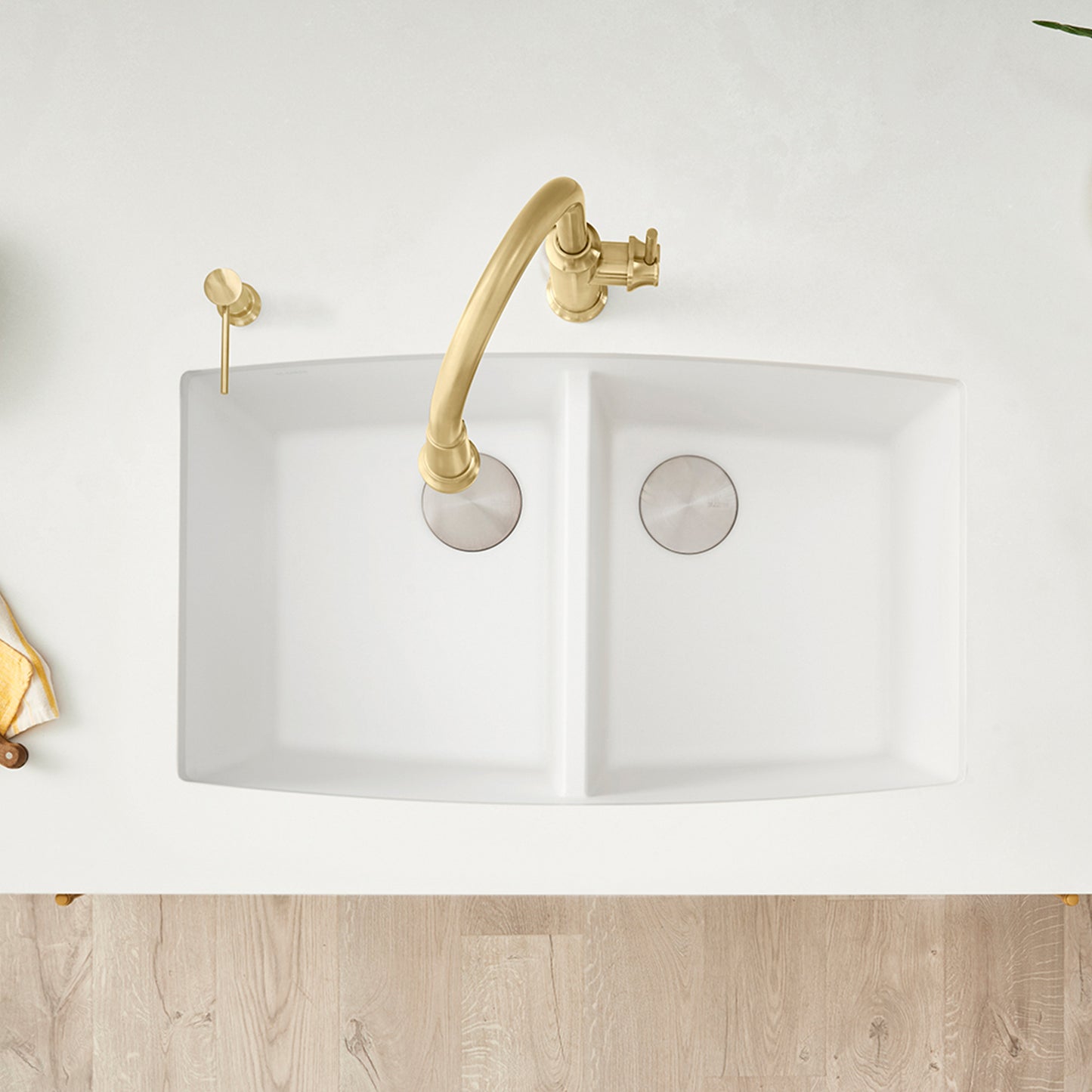BLANCO Performa SILGRANIT 33" 50/50 Double Bowl Undermount Kitchen Sink with a stylish faucet.