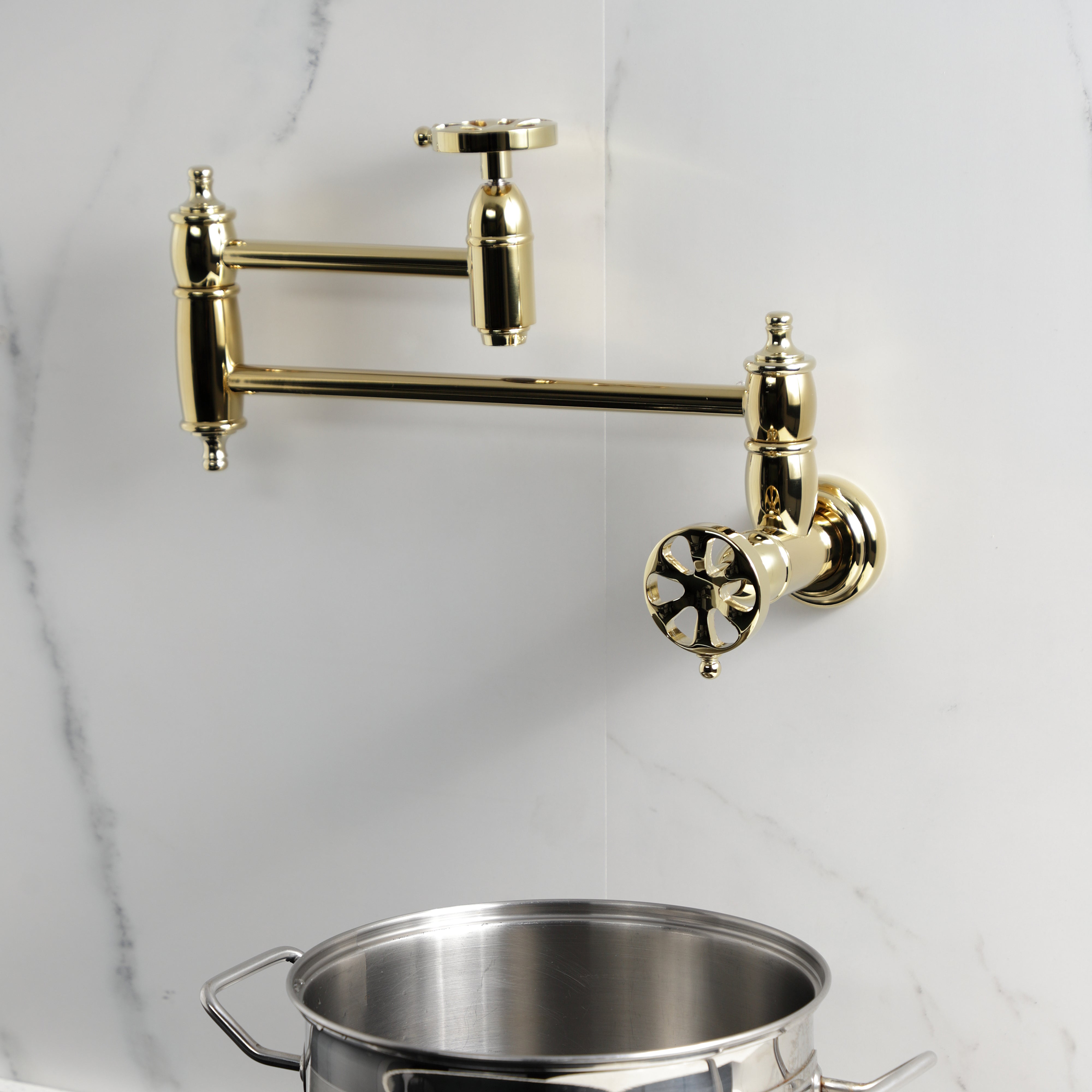 Kingston Brass KS3103RX Belknap Wall Mount Pot Filler Faucet, Antique Brass with swing arms for easy pot filling.