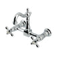 Kingston KS2443AX Heritage Two-Handle Wall Mount Bridge Kitchen Faucet, Antique Brass with polished chrome finish.