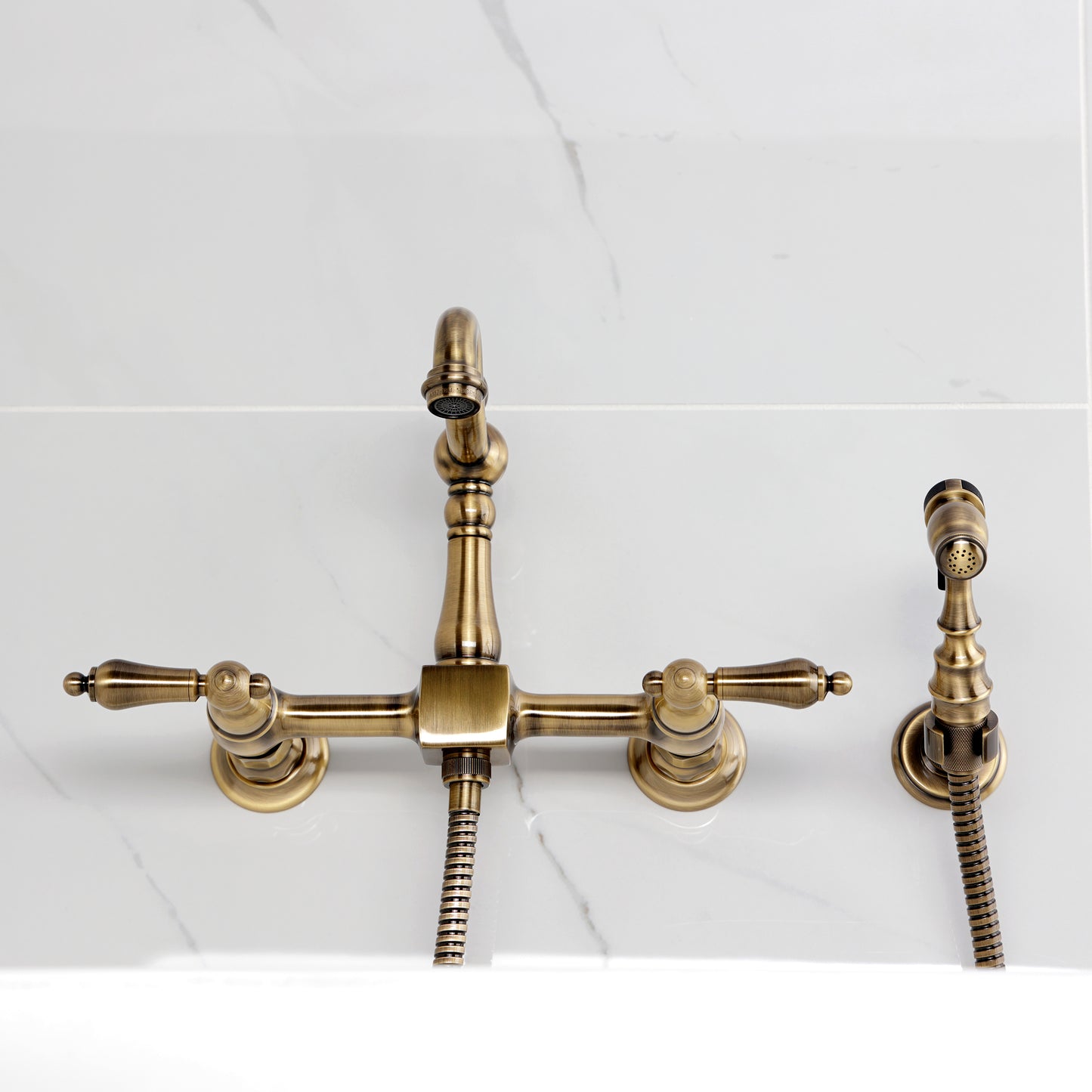 Kingston KS2443ALBS Heritage Two-Handle Wall Mount Bridge Kitchen Faucet with Brass Sprayer, Antique Brass