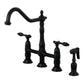 Kingston KS1273TALBS Tudor Bridge Kitchen Faucet with Brass Sprayer, Antique Brass in Matte Black finish.