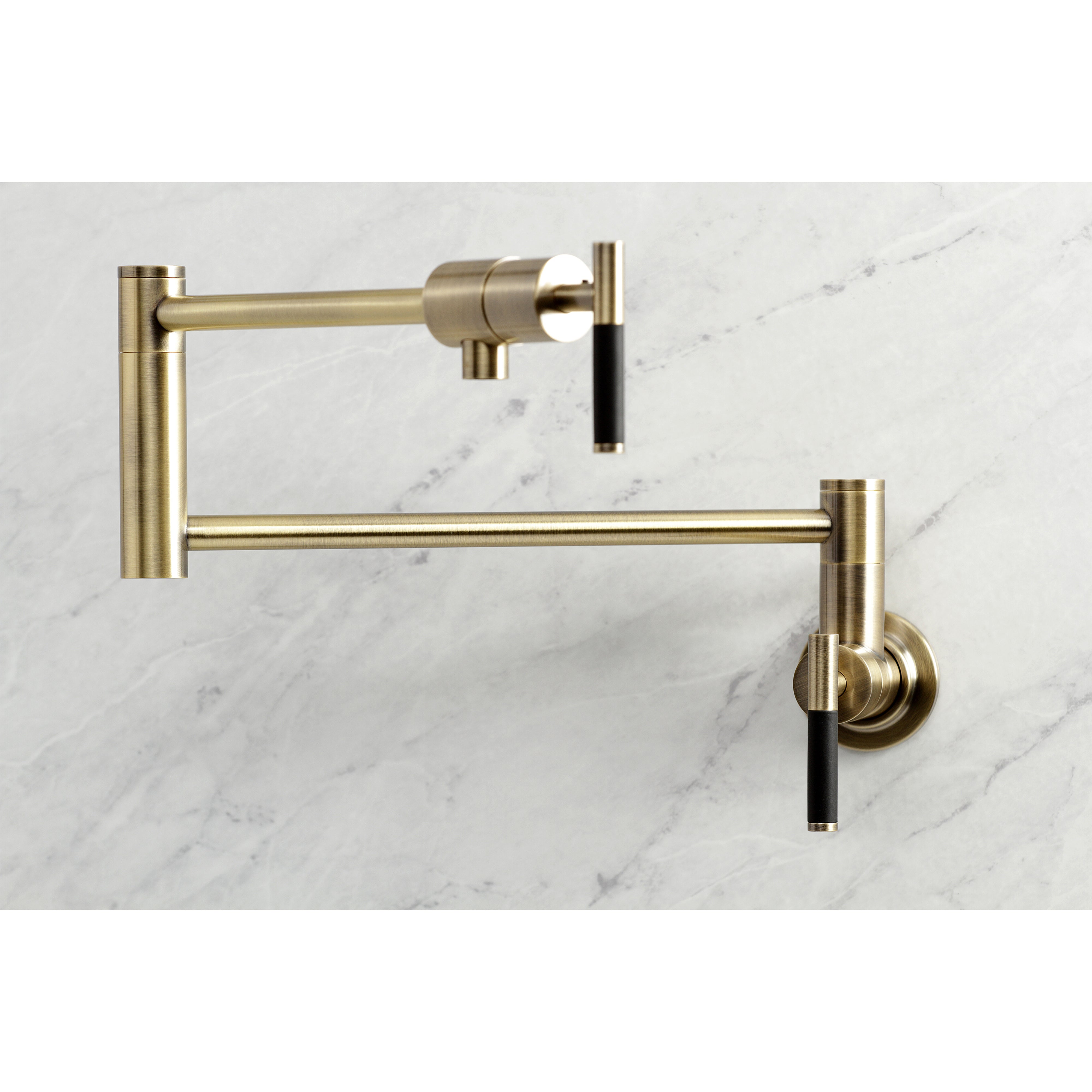 Kingston Brass KS4103CKL Kaiser Wall Mount Pot Filler Faucet, Antique Brass on marble background.