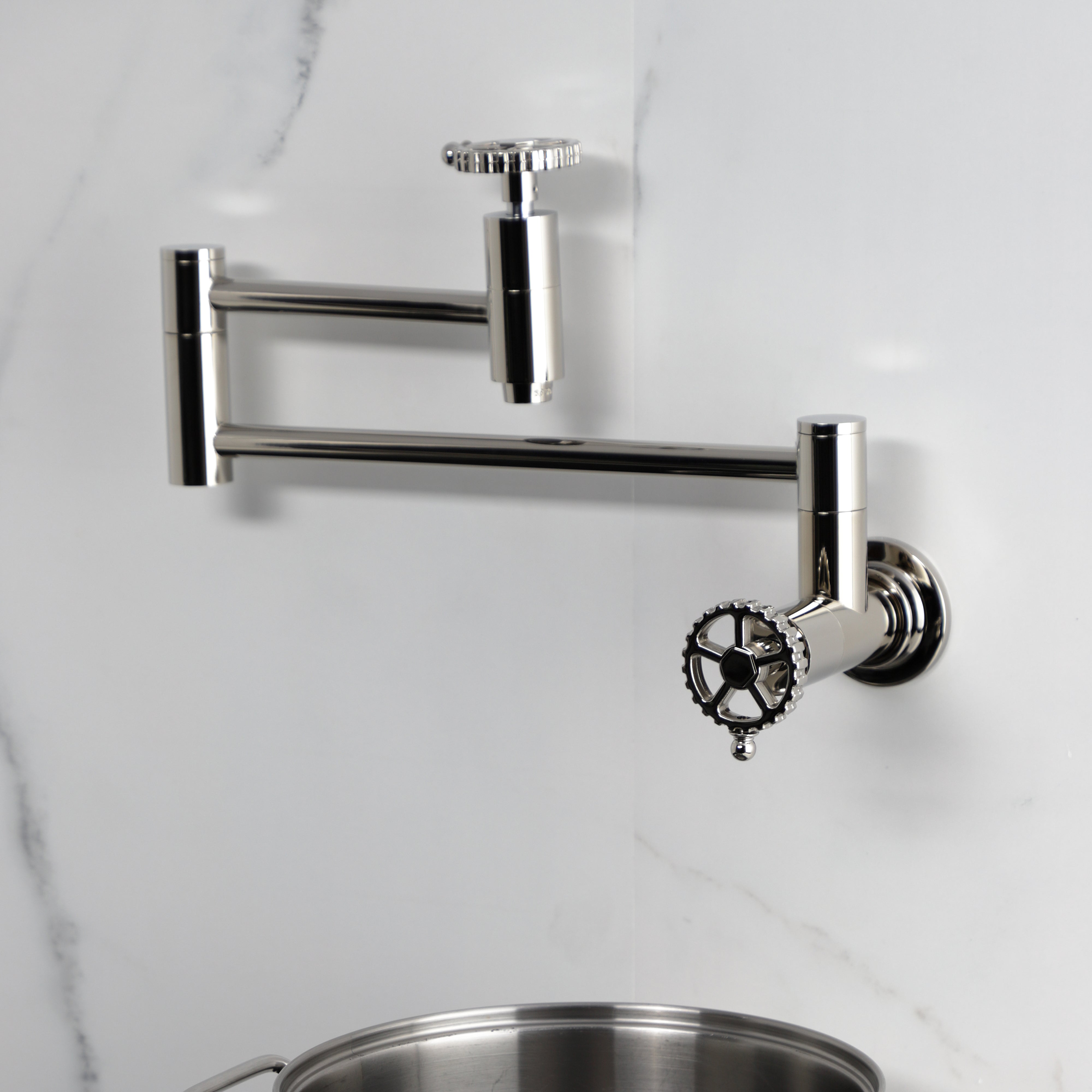Kingston Brass KS8103CG Fuller Wall Mount Pot Filler Faucet, Antique Brass with foldable swing arms and vintage design.