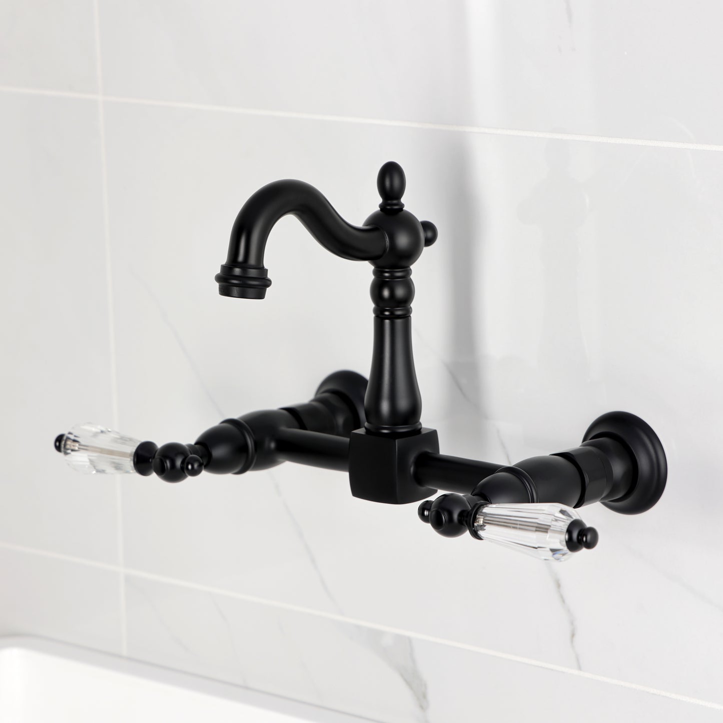 Kingston KS2443WLL Willshire Two-Handle Wall Mount Bridge Kitchen Faucet, Antique Brass in black finish.