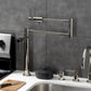 Kingston Brass KS4703DL Concord Deck Mount Pot Filler Faucet, Antique Brass on a kitchen countertop.