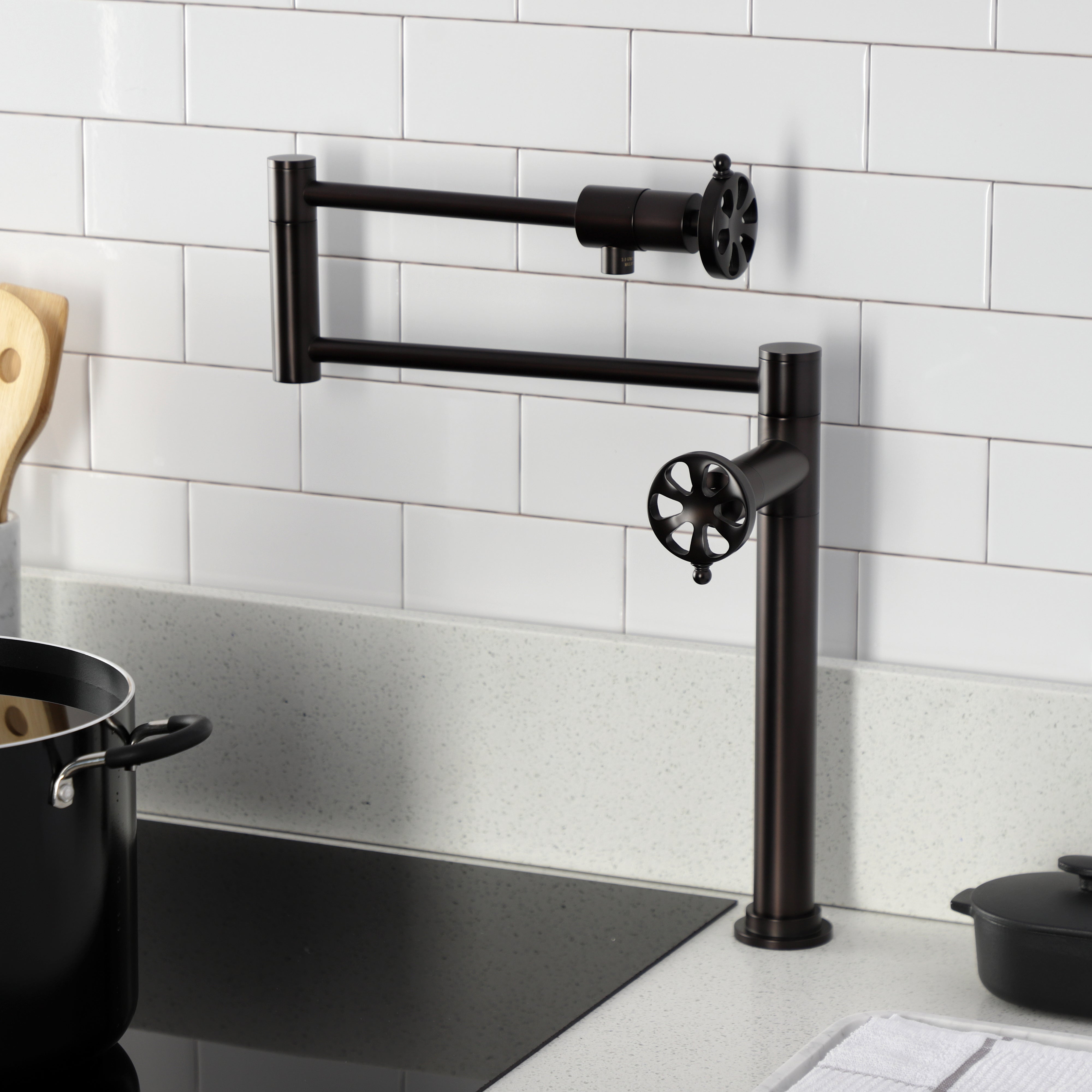 Kingston Brass KS4708RX Belknap Deck Mount Pot Filler Faucet, Brushed Nickel installed in modern kitchen.
