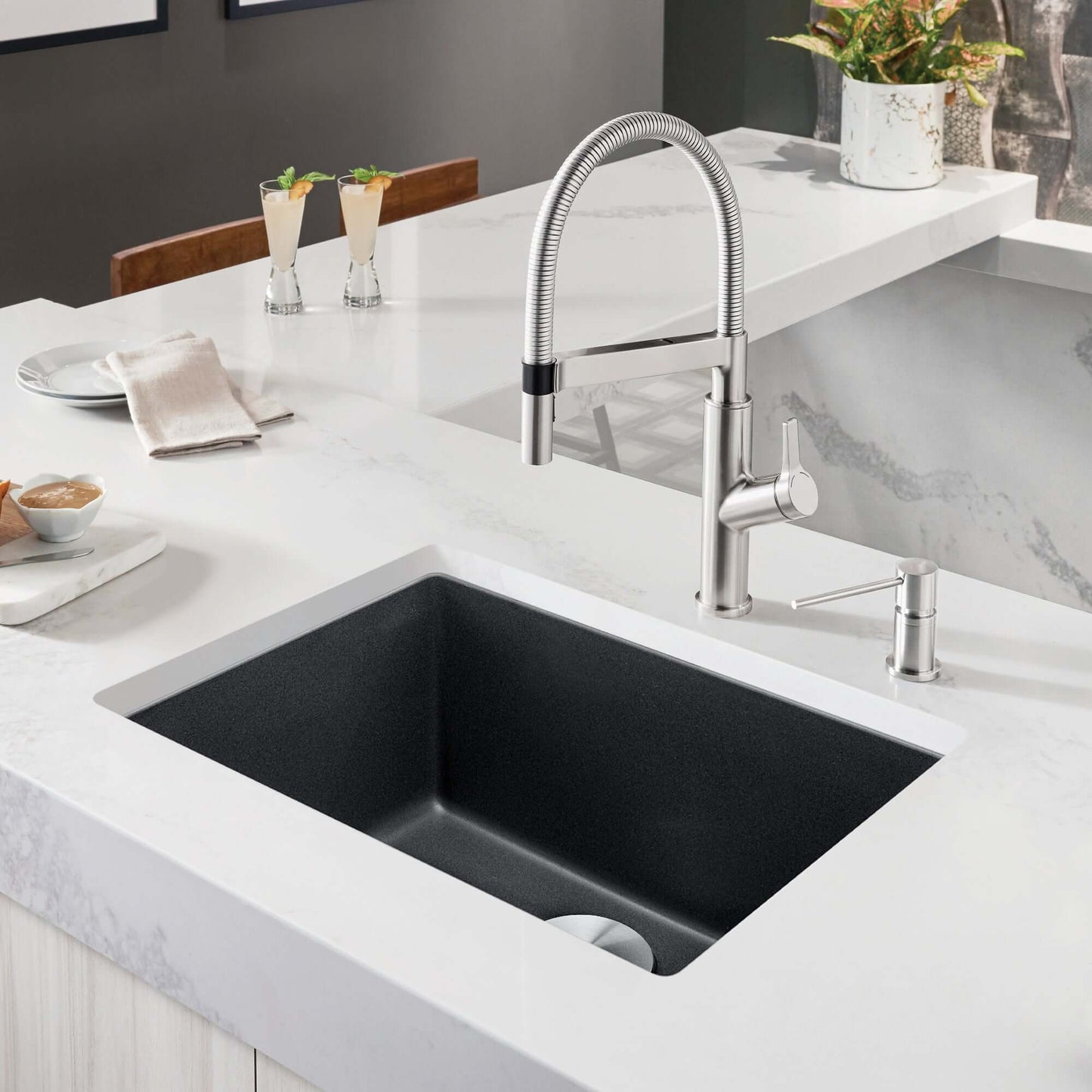 BLANCO PRECIS 24" SILGRANIT Compact Undermount Sink with modern faucet in sleek kitchen countertop setting.