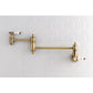 Kingston Brass KS3103BPL Bel-Air Wall Mount Pot Filler Faucet, Antique Brass on a white tiled backdrop.