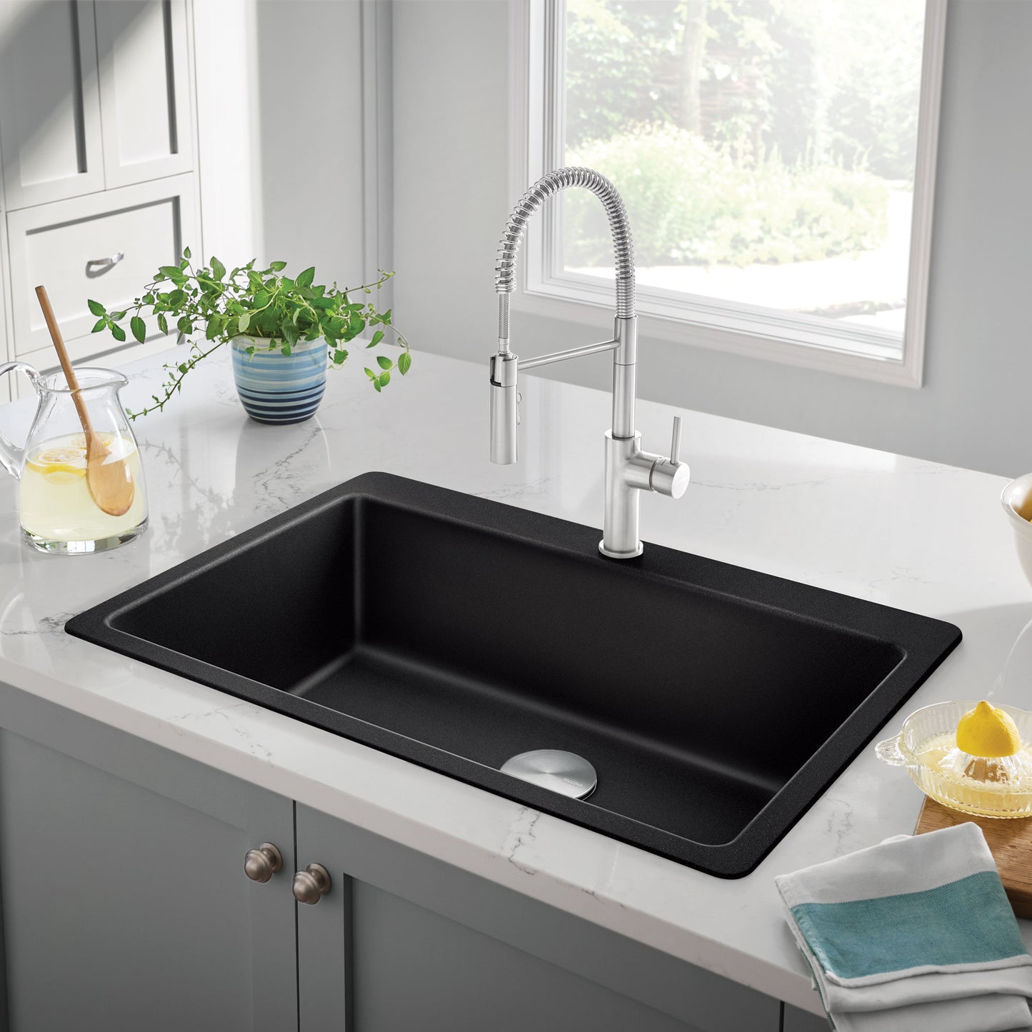 BLANCO Catris Semi-Pro Pull-Down Dual-Spray Kitchen Faucet with spring-coil design in a stylish kitchen setting.