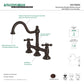 Kingston KS3788AX Restoration Bridge Kitchen Faucet, Brushed Nickel in oil-rubbed bronze finish with metal cross handles.