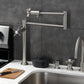 Kingston Brass KS4708ZX Millennium Deck Mount Pot Filler Faucet, Brushed Nickel close-up in modern kitchen setting.