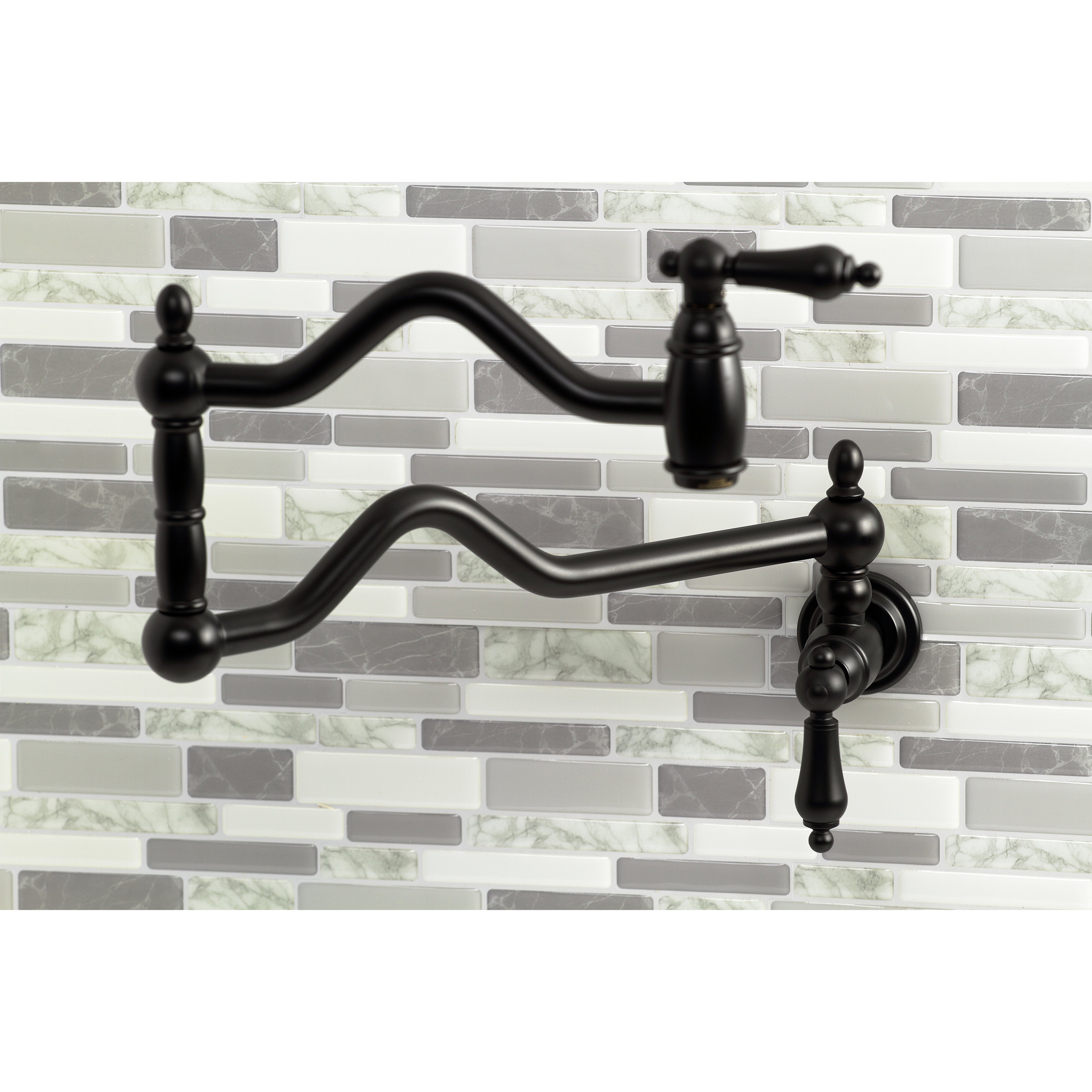 Kingston Brass KS2107AL Heritage Wall Mount Pot Filler Faucet, Brushed Brass on a stylish backsplash.