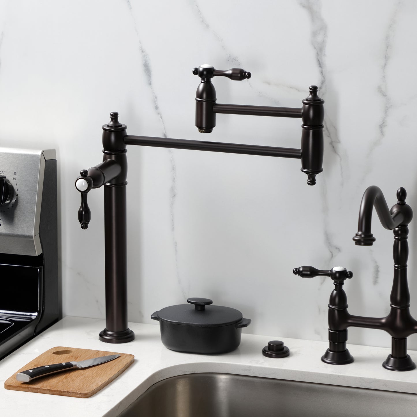 Kingston Brass KS3708TAL Tudor Deck Mount Pot Filler Faucet, Brushed Nickel on countertop with black cookware.