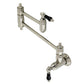 Kingston Brass KS3103PKL Duchess Wall Mount Pot Filler Faucet, Antique Brass with black porcelain handles.