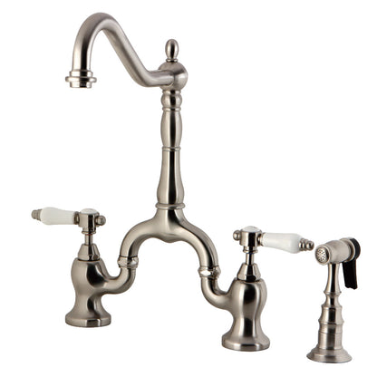 Kingston KS7753BPLBS Bel-Air Bridge Kitchen Faucet with Brass Sprayer, Antique Brass in brushed nickel finish.