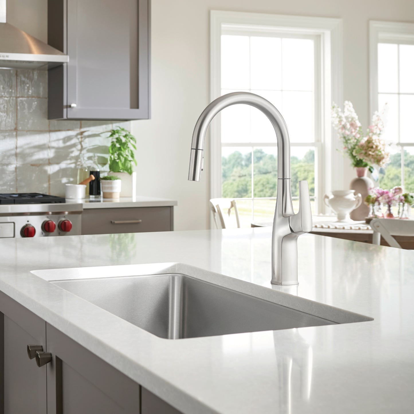 BLANCO Formera 33" Super Single Undermount Stainless Steel Kitchen Sink with sleek faucet in modern kitchen setting.