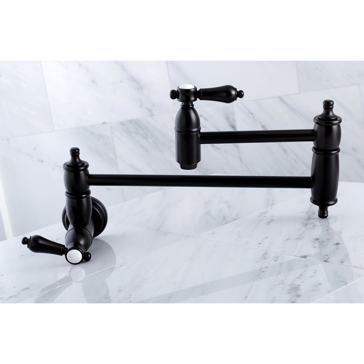 Kingston Brass KS3103BAL Heirloom Wall Mount Pot Filler Faucet, Antique Brass on marble surface