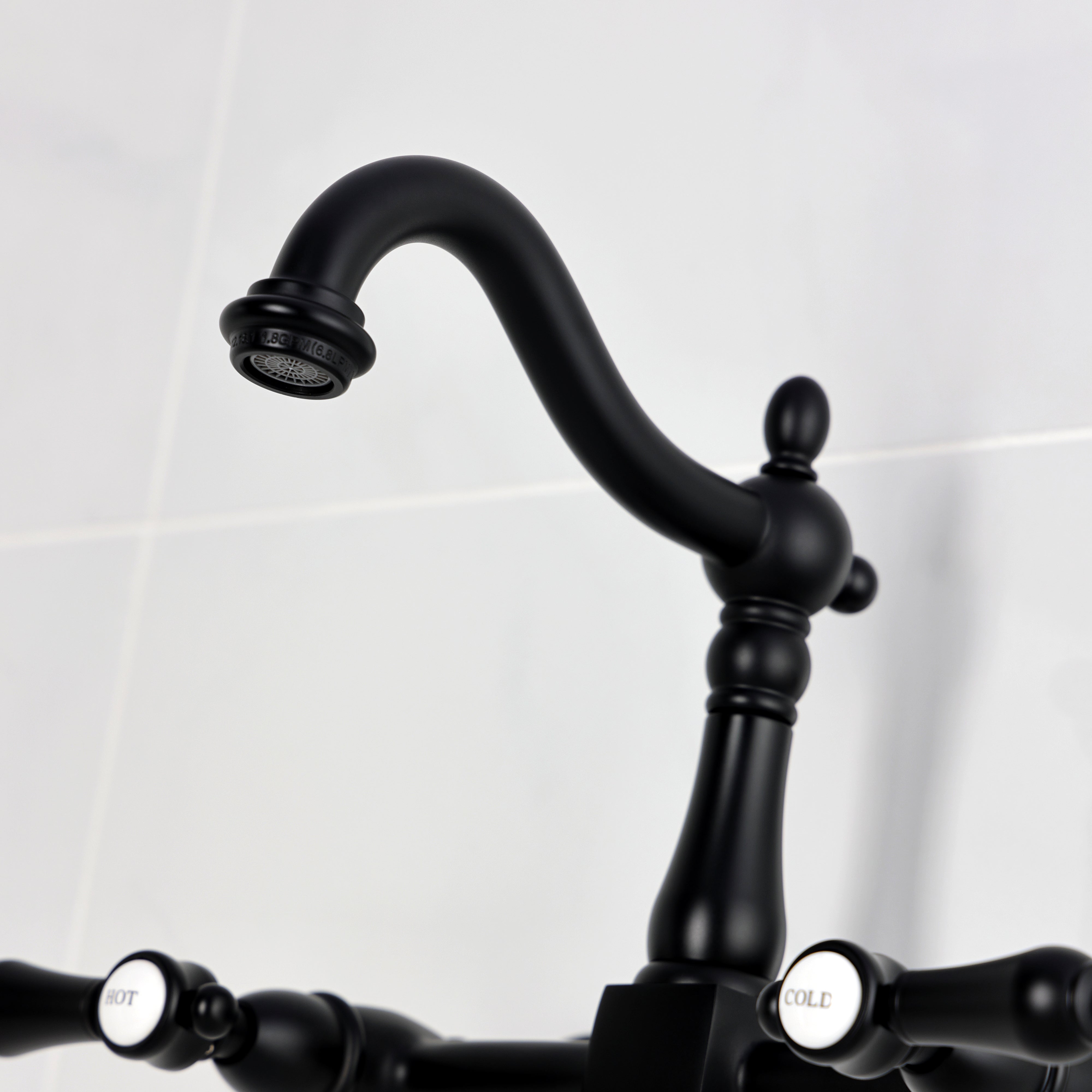 Kingston KS1263BAL Heirloom Two-Handle Wall Mount Bridge Kitchen Faucet, Antique Brass close-up view