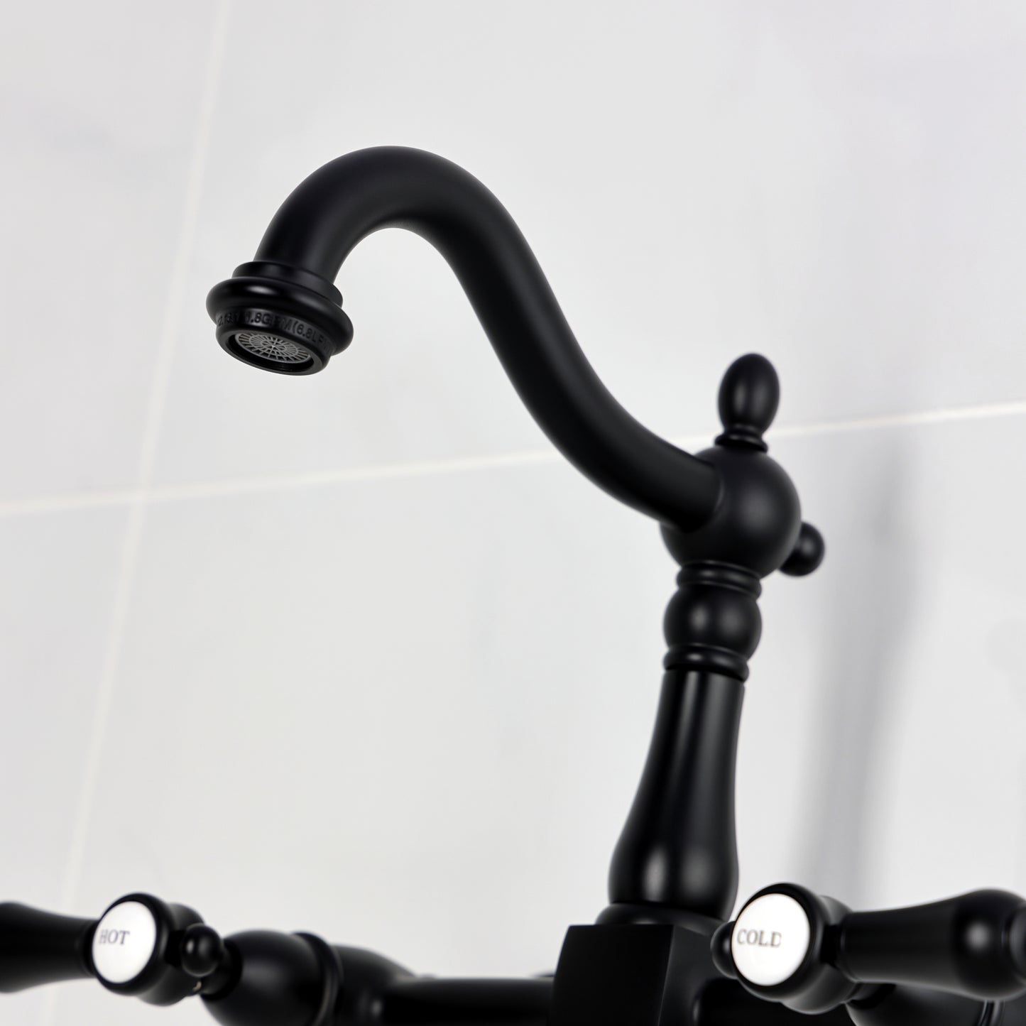 Kingston KS1263BAL Heirloom Two-Handle Wall Mount Bridge Kitchen Faucet, Antique Brass close-up view