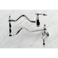 Kingston Brass KS2107TAL Tudor Wall Mount Pot Filler Faucet, Brushed Brass on marble background