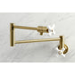 Kingston Brass KS4107PX Metropolitan Wall Mount Pot Filler Faucet, Brushed Brass close-up image with swing arms